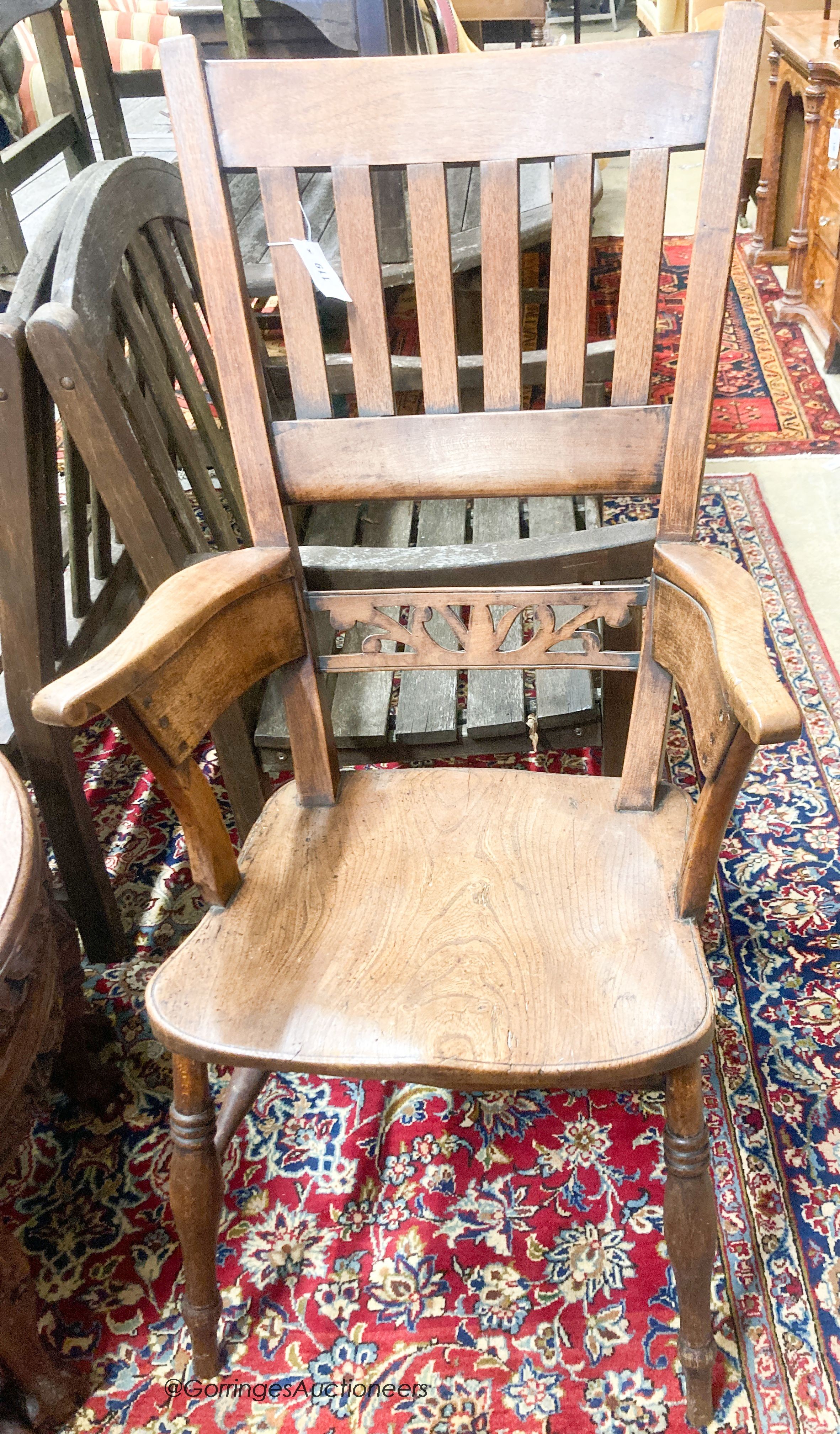 An early Victorian elm and beech Windsor armchair, width 54cm, depth 44cm, height 112cm